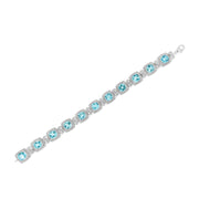 Bids.com .925 Sterling Silver 7x7 mm Cushion Cut Blue Topaz and 1/10 Ctw Single Cut Diamond Square Shape Tennis Bracelet (I-J Color, I1-I2 Clarity) - 7" Bracelets