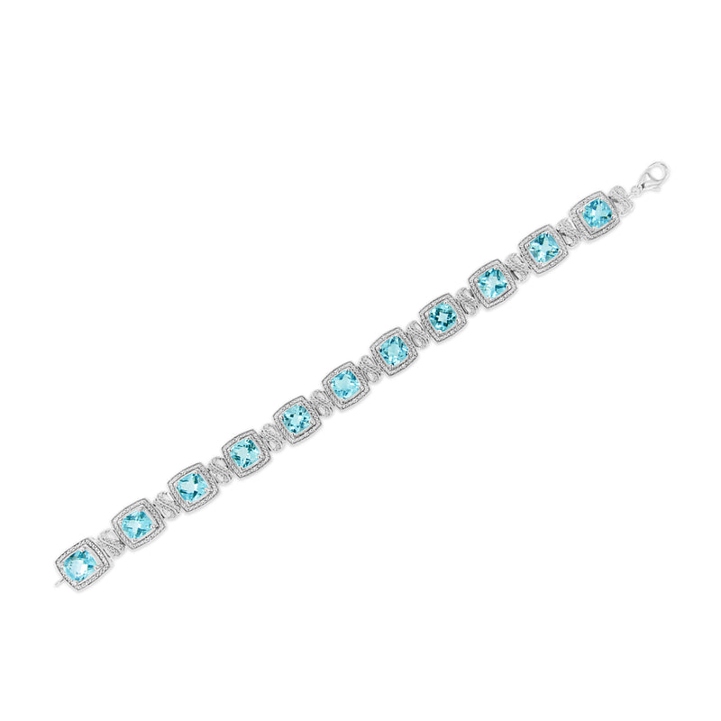 Bids.com .925 Sterling Silver 7x7 mm Cushion Cut Blue Topaz and 1/10 Ctw Single Cut Diamond Square Shape Tennis Bracelet (I-J Color, I1-I2 Clarity) - 7" Bracelets