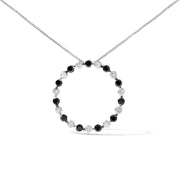 Bids.com .925 Sterling Silver 1 3/4 Cttw Alternating Black and White Diamond Open Circle Hoop Pendant Necklace (H-I Color, I2-I3 Clarity) - 18" Inches Necklaces
