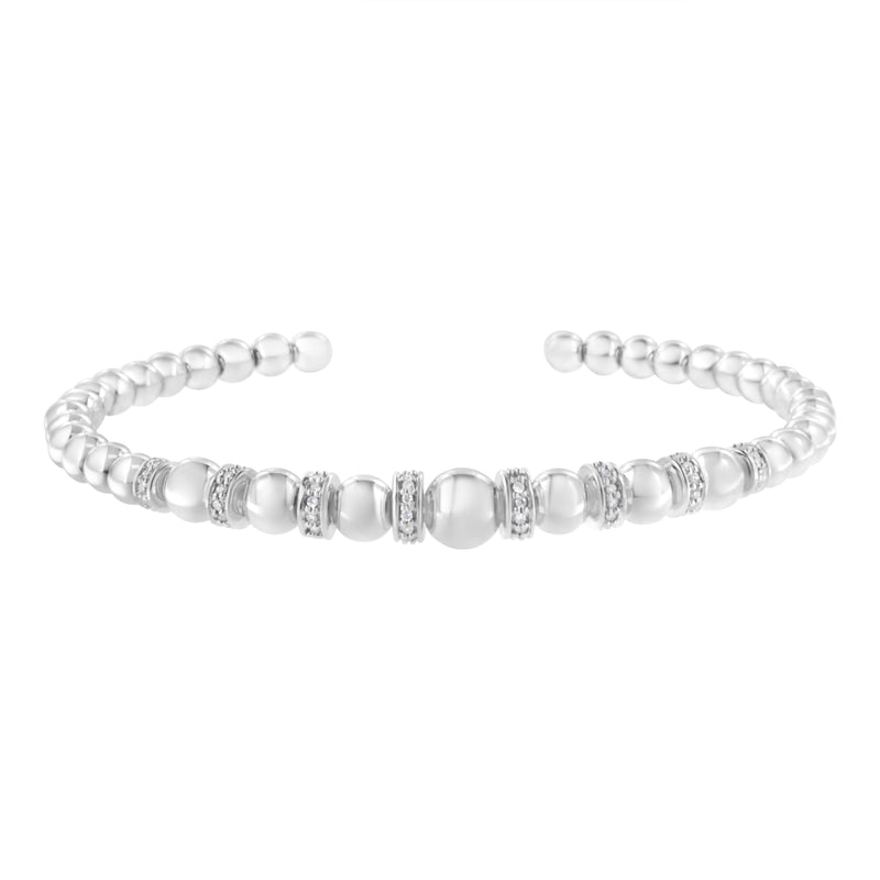 Bids.com .925 Sterling Silver 1/4 Cttw Diamond Rondelle Graduated Ball Bead Cuff Bangle Bracelet (I-J color, I2-I3 clarity) - Fits wrists up to 7 1/2 inches Bracelets