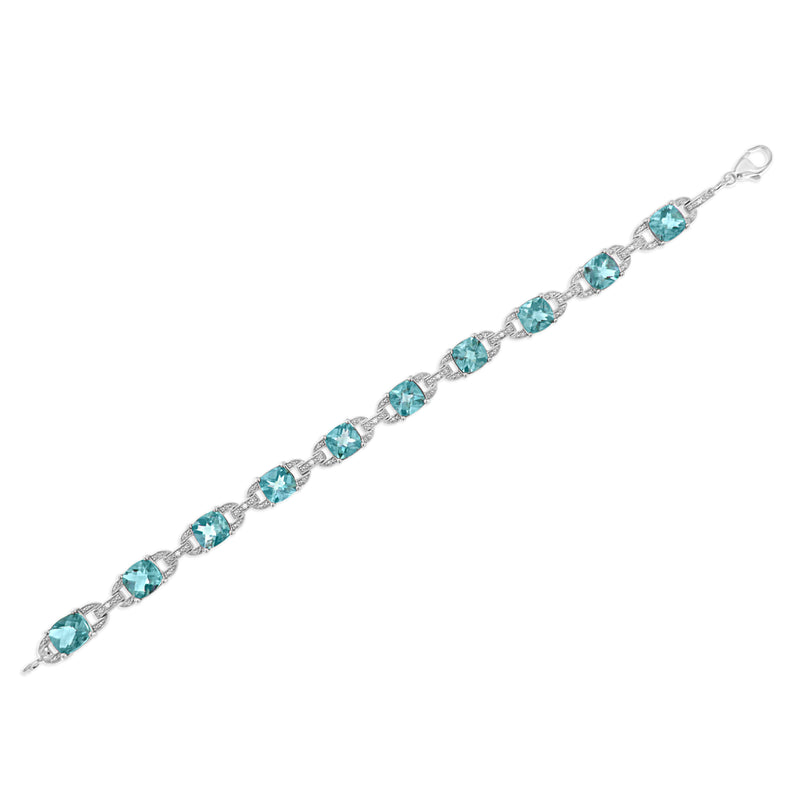 Bids.com .925 Sterling Silver 7x7 mm Cushion Cut Blue Topaz and 1/20 cttw Round Cut Diamond Fashion Tennis Bracelet (I-J Color, I1-I2 Clarity) - 7" Bracelets