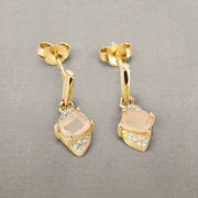 Bids.com 0.57 Carat Genuine Ethiopian Opal and White Diamond 14K Yellow Gold Earrings Earrings