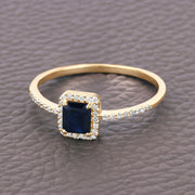 Bids.com 0.60 Carat Genuine Blue Sapphire and White Diamond 14K Yellow Gold Ring Rings