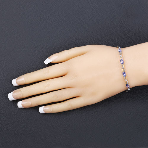 Bids.com 1.81 Carat Genuine Tanzanite and White Topaz .925 Sterling Silver Bracelet Bracelets