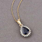 Bids.com 2.09 Carat Genuine Blue Sapphire and White Diamond 14K Yellow Gold Pendant Pendants