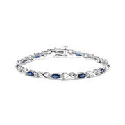 Bids.com 10K White Gold 5x4mm Oval Sapphire Gemstone and 1/10 Cttw Diamond Prong Set "X" Link Bracelet - Size 7" (H-I Color, SI1-SI2 Clarity) Bracelets
