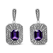 Bids.com .925 Sterling Silver Diamond Accent and 7x5mm Purple Amethyst Stud Earrings (I-J Color, I2-I3 Clarity) Earrings