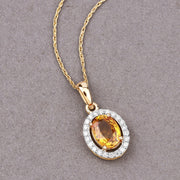 Bids.com 1.78 Carat Genuine Yellow Sapphire and White Diamond 14K Yellow Gold Pendant Pendants