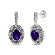 Bids.com .925 Sterling Silver Diamond Accent and 8x6mm Purple Oval Amethyst Stud Earrings (I-J Color, I1-I2 Clarity) Earrings