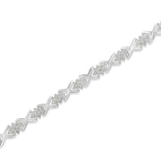 Bids.com .925 Sterling Silver 1-1/2 Cttw Diamond Cluster X Link 7" Tennis Bracelet (I-J color, I3 clarity) Bracelets