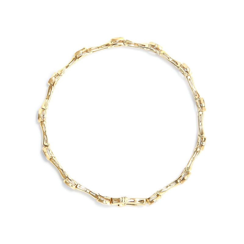 Bids.com 10K Yellow Gold Plated .925 Sterling Silver 1.0 Cttw Miracle Set Diamond Bezel Style Station Link Bracelet (H-I Color, I3 Clarity) - Size 7" Bracelets
