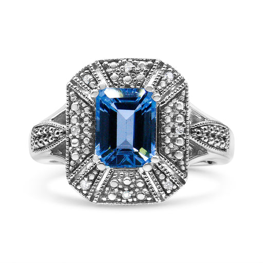 Bids.com .925 Sterling Silver Diamond Accent and 8X6 mm Emerald-Shape Blue Topaz Ring (I-J Color, I2-I3 Clarity) - Ring Size 7 Rings