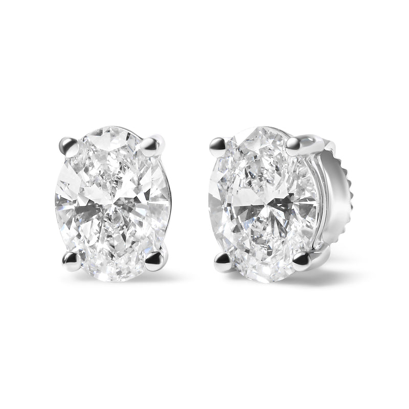 Bids.com 14K White Gold 3/4 Cttw Oval Shape Lab Grown Diamond Solitaire Stud Earrings (F-G Color, VS1-VS2 Clarity) Earrings