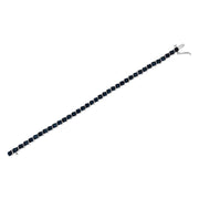 Bids.com .925 Sterling Silver 1/10 Cttw Miracle-Set Treated Blue Color Diamond Miracle Plate "S" Link Tennis Bracelet (Blue Color, I2- I3 Clarity) - 7.25" Bracelets