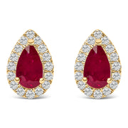Bids.com 10K Yellow Gold 5X3 MM Pear-Cut Ruby and 1/7 Cttw Diamond Halo Stud Earrings (I-J Color, I1-I2 Clarity) Earrings