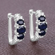 Bids.com 1.66 Carat Genuine Blue Sapphire and White Topaz .925 Sterling Silver Earrings Earrings