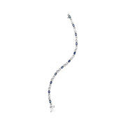 Bids.com 10K White Gold 5x4mm Oval Sapphire Gemstone and 1/10 Cttw Diamond Prong Set "X" Link Bracelet - Size 7" (H-I Color, SI1-SI2 Clarity) Bracelets