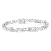 Bids.com .925 Sterling Silver 1.0 Cttw Round-Cut and Baguette-Cut Diamond X-Link Bracelet (I-J Color, I1-I2 Clarity) - 7" Bracelets