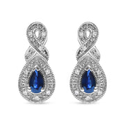 Bids.com .925 Sterling Silver 4.5 x 3mm Pear Sapphire Gemstone and Diamond Accent Infinity Drop Stud Earrings (H-I Color, SI1-SI2 Clarity) Earrings