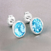 Bids.com 4.00 Carat Genuine Swiss Blue Topaz .925 Sterling Silver Earrings Earrings