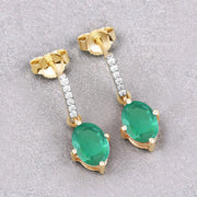 Bids.com 1.49 Carat Genuine Zambian Emerald and White Diamond 10K Yellow Gold Earrings Earrings