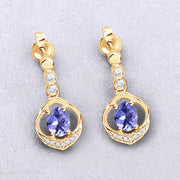 Bids.com 0.76 Carat Genuine Tanzanite and White Diamond 14K Yellow Gold Earrings Earrings