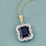 Bids.com 4.07 Carat Genuine Iolite and White Diamond 14K Yellow Gold Pendant Pendants