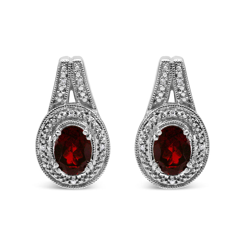 Bids.com .925 Sterling Silver Diamond Accent and 8x6mm Red Oval Garnet Stud Earrings (I-J Color, I1-I2 Clarity) Earrings