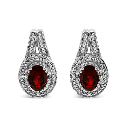 Bids.com .925 Sterling Silver Diamond Accent and 8x6mm Red Oval Garnet Stud Earrings (I-J Color, I1-I2 Clarity) Earrings