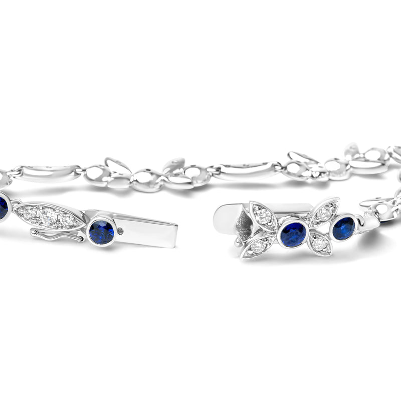 Bids.com 18K White Gold 1 3/4 Cttw Diamond and 3x3mm Round Blue Sapphire Gemstone Floral Link Bracelet (G-H Color, SI1-SI2 Clarity) - Size 7" Bracelets