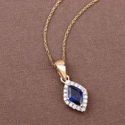 Bids.com 0.92 Carat Genuine Blue Sapphire and White Diamond 14K Yellow Gold Pendant Pendants