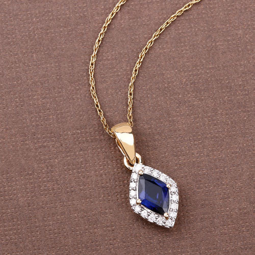 Bids.com 0.92 Carat Genuine Blue Sapphire and White Diamond 14K Yellow Gold Pendant Pendants