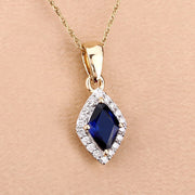 Bids.com 0.92 Carat Genuine Blue Sapphire and White Diamond 14K Yellow Gold Pendant Pendants