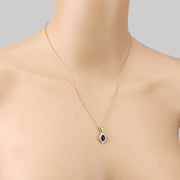 Bids.com 0.92 Carat Genuine Blue Sapphire and White Diamond 14K Yellow Gold Pendant Pendants