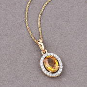 Bids.com 1.78 Carat Genuine Yellow Sapphire and White Diamond 14K Yellow Gold Pendant Pendants