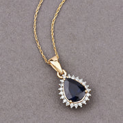 Bids.com 2.09 Carat Genuine Blue Sapphire and White Diamond 14K Yellow Gold Pendant Pendants