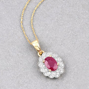 Bids.com 0.95 Carat Genuine Ruby and White Diamond 10K Yellow Gold Pendant Pendants