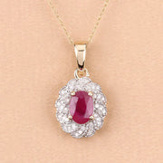 Bids.com 0.95 Carat Genuine Ruby and White Diamond 10K Yellow Gold Pendant Pendants