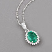 Bids.com 1.36 Carat Genuine Zambian Emerald and White Diamond 10K White Gold Pendant Pendants