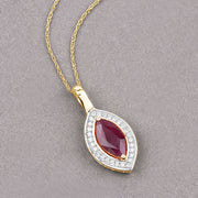 Bids.com 1.52 Carat Genuine Ruby and White Diamond 10K Yellow Gold Pendant Pendants