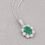 Bids.com 0.79 Carat Genuine Zambian Emerald and White Diamond 10K White Gold Pendant Pendants