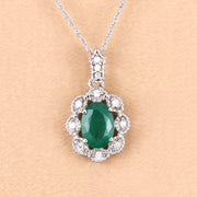 Bids.com 0.79 Carat Genuine Zambian Emerald and White Diamond 10K White Gold Pendant Pendants