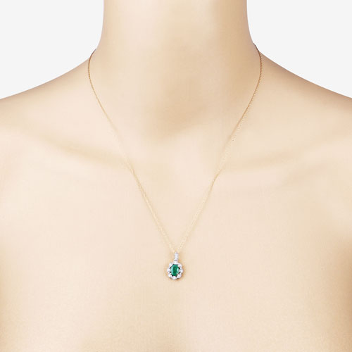 Bids.com 0.79 Carat Genuine Zambian Emerald and White Diamond 10K Yellow Gold Pendant Pendants