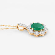 Bids.com 0.79 Carat Genuine Zambian Emerald and White Diamond 10K Yellow Gold Pendant Pendants