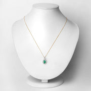 Bids.com 0.79 Carat Genuine Zambian Emerald and White Diamond 10K Yellow Gold Pendant Pendants