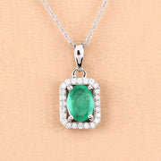 Bids.com 0.83 Carat Genuine Zambian Emerald and White Diamond 10K White Gold Pendant Pendants