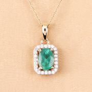 Bids.com 0.83 Carat Genuine Zambian Emerald and White Diamond 10K Yellow Gold Pendant Pendants