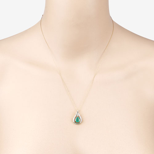 Bids.com 1.18 Carat Genuine Zambian Emerald and White Diamond 10K Yellow Gold Pendant Pendants