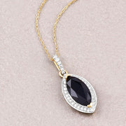 Bids.com 2.27 Carat Genuine Blue Sapphire and White Diamond 10K Yellow Gold Pendant Pendants