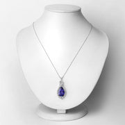 Bids.com 7.11 Carat Genuine Tanzanite and White Diamond 14K White Gold Pendant Pendants